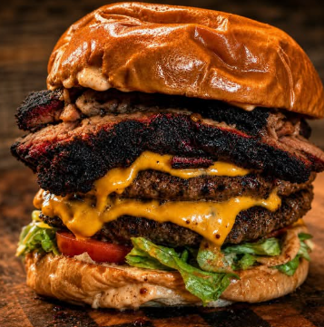 Double cheeseburger stacked with smoked brisket, lettuce and tomato