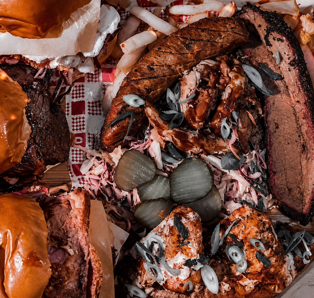 Southwest Barbecue mixed feast with brisket, burgers and smoked meats
