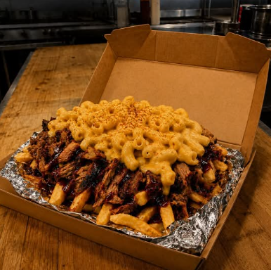 Southwest Barbecue loaded fries box with smoked meat and mac and cheese